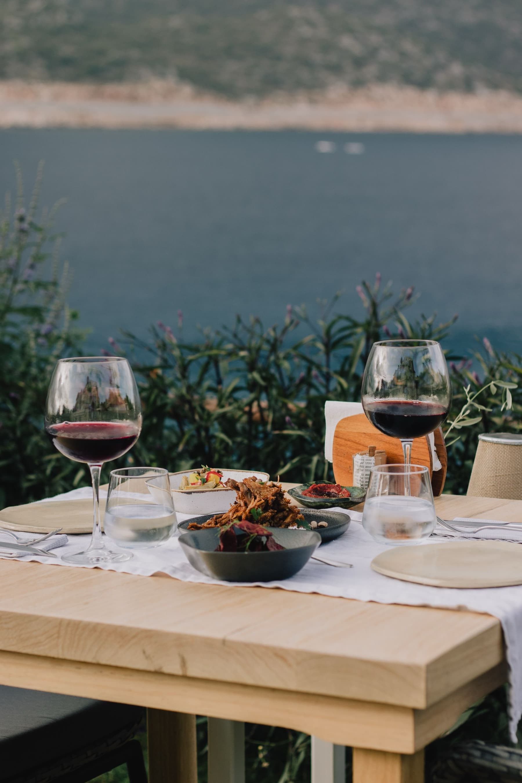A table set for dinner above the Mediterranean sea